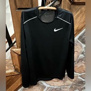 Ladies Nike, M dri-fit, technology, running long-sleeved shirt with mesh back.